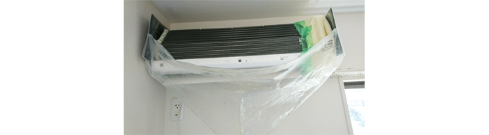 お掃除機能付き壁掛けエアコンクリーニング洗浄中写真